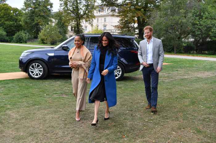 Meghan, Duchess of Sussex (C) arrives with her mother, Doria Ragland (L) and Britain's Prince Harry
