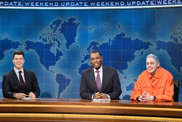 Colin Jost and Michael Che with Pete Davidson during "Weekend Update."