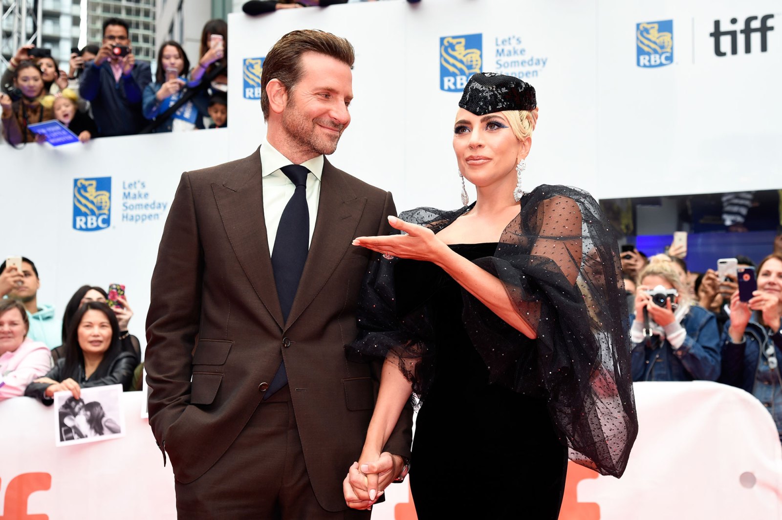 Bradley Cooper (L) and Lady Gaga