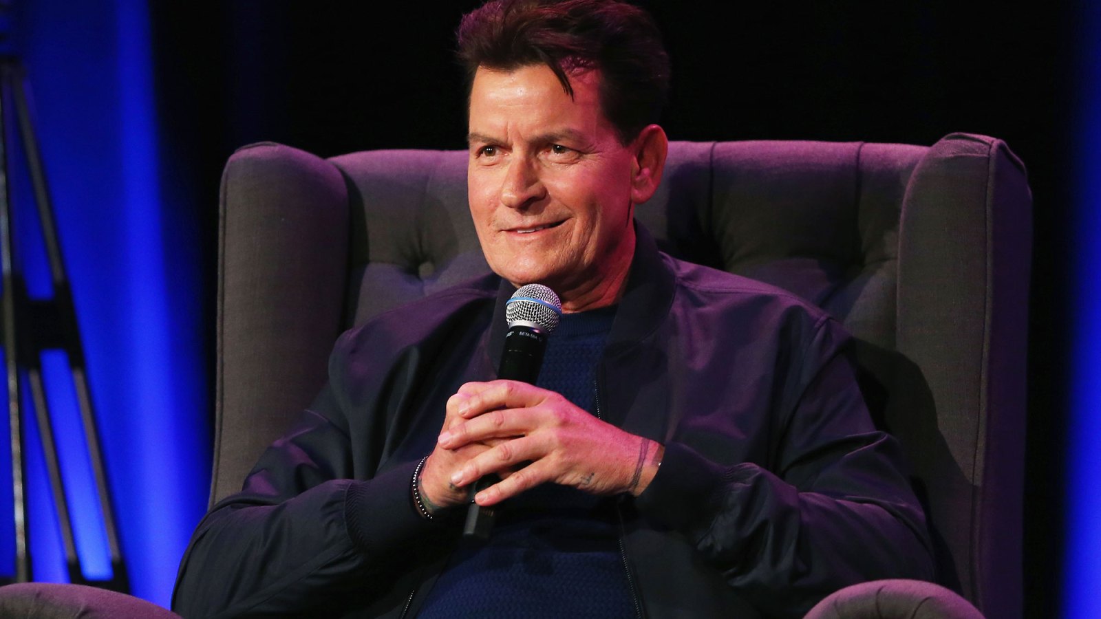 charlie sheen bomber jacket microphone chair