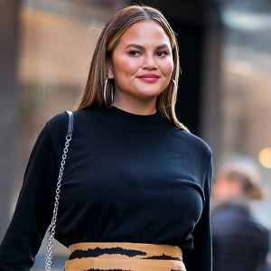 Chrissy Teigen Angers Twitter Users By Putting Cream Cheese on Spicy Sausage Hot Dog