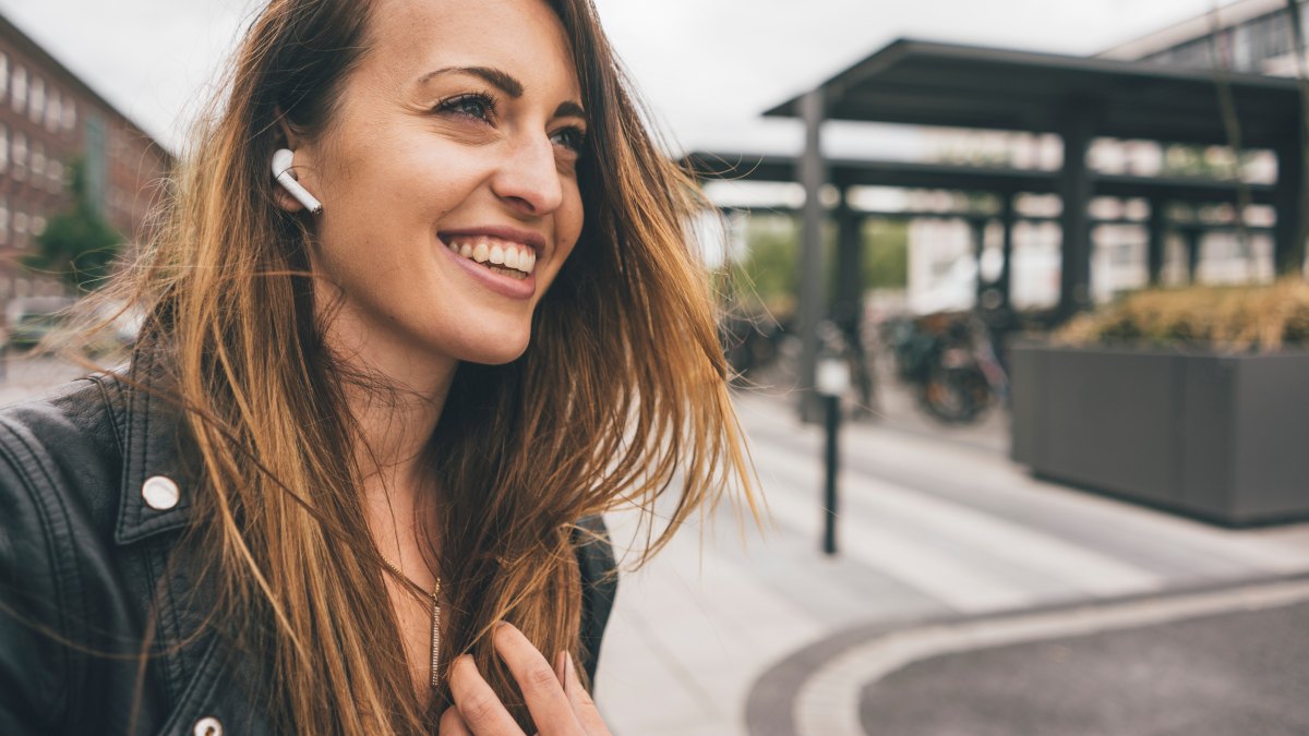 woman with airpods on