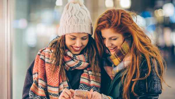 women with shopping bags
