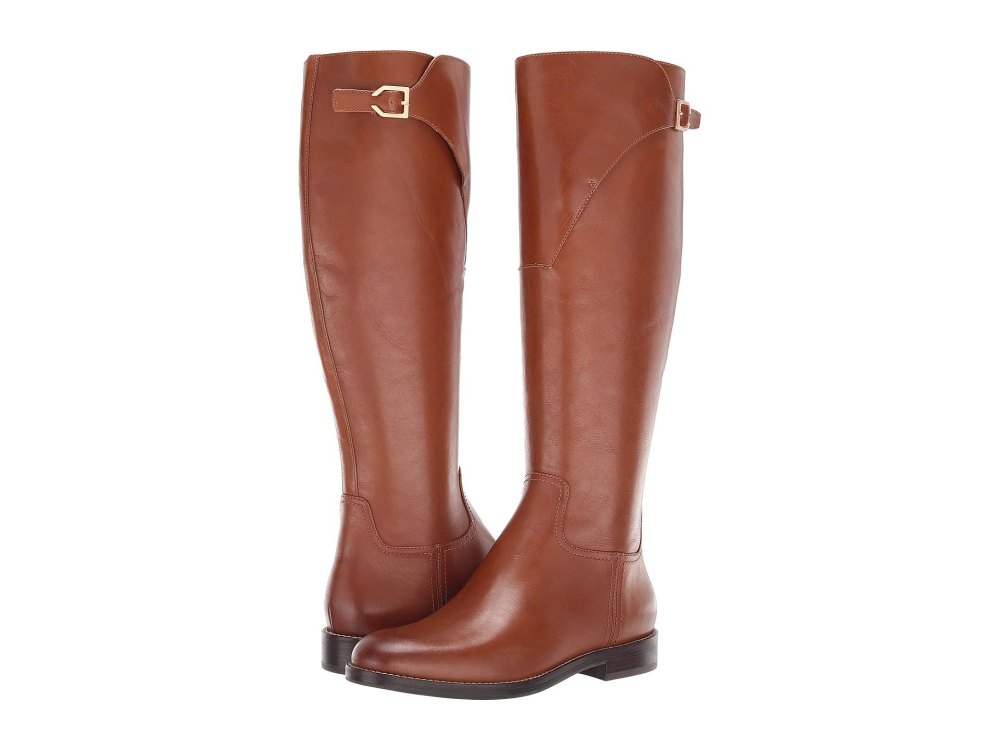 tan cole haan riding boots with a flat heel