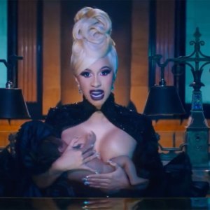 Cardi B Breastfeeds, Plays Piano Naked in New 'Money' Video