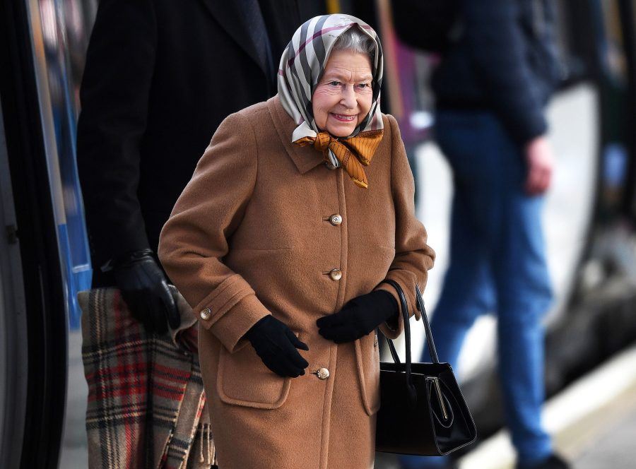 The Queen wraps up warm as she takes train to Norfolk for annual Christmas break