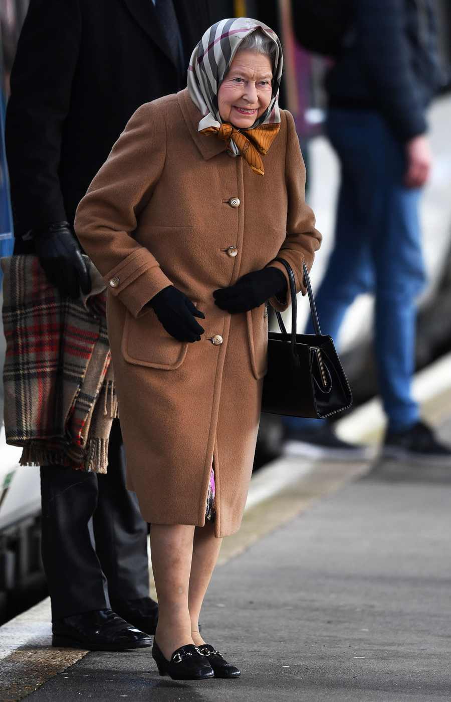 The Queen wraps up warm as she takes train to Norfolk for annual Christmas break