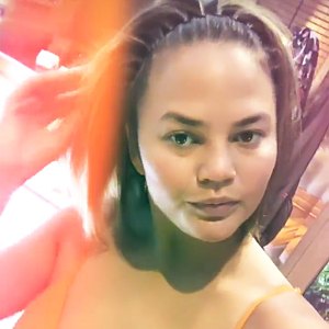 Chrissy Teigen Hilariously Rocks the '90s Accordion Headband