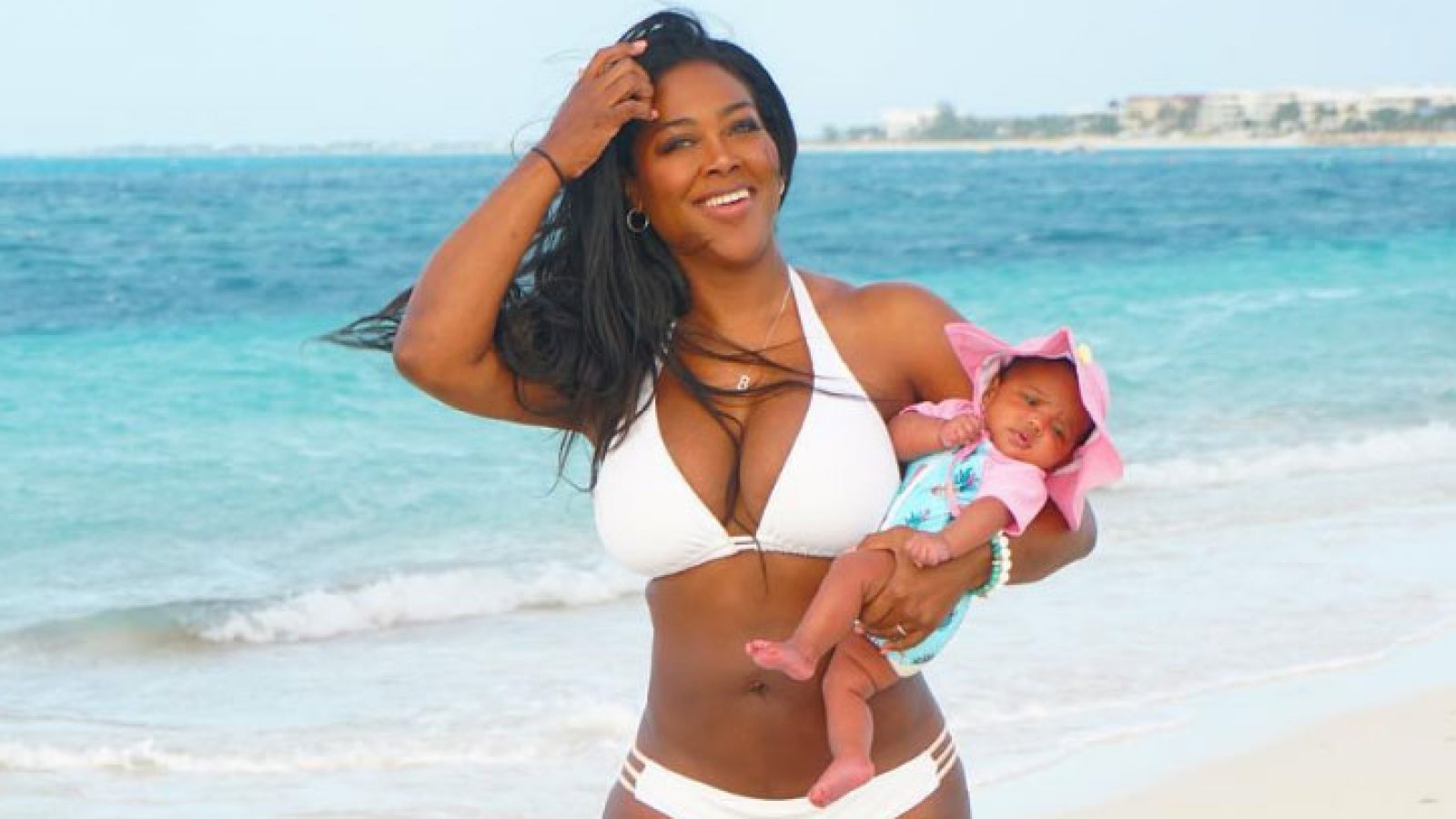 Kenya Moore Bares Her Post Baby Body In White Bikini With Daughter