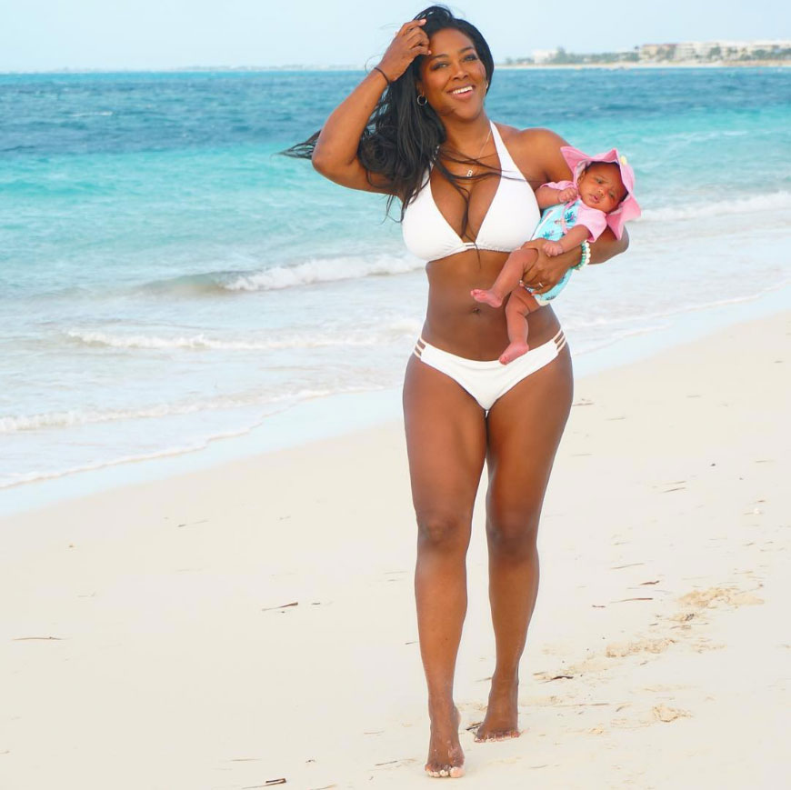 Kenya Moore Bares Her Post-Baby Body in White Bikini at the Beach With Daug...