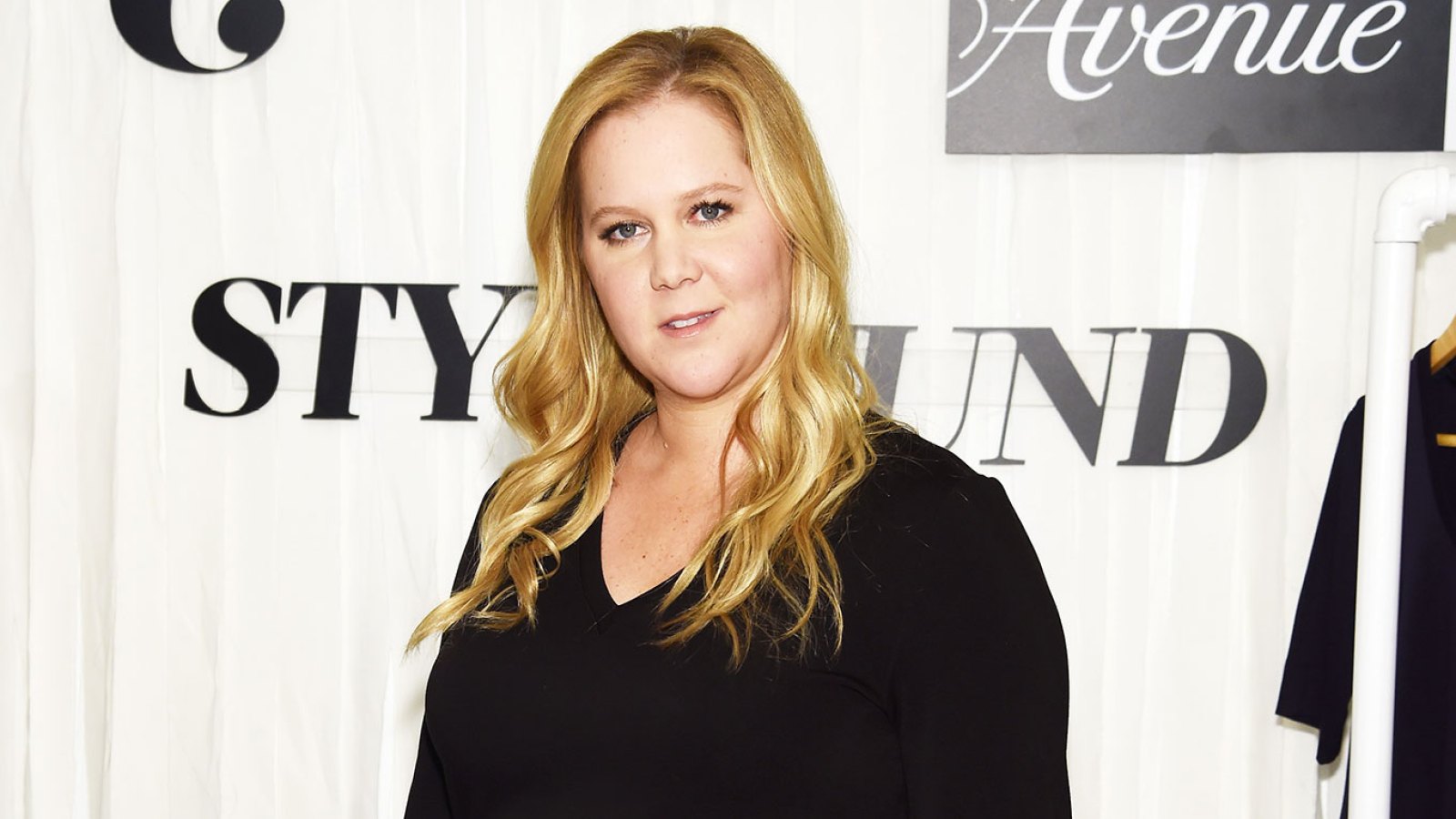 Pregnant Amy Schumer Models Bathing Suit That 'Fits Like a Small Glove'