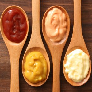 Spoons with various condiments