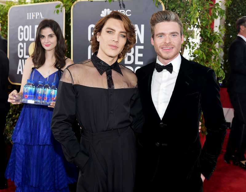 Cody Fern (L) and Richard Madden attend FIJI Water at the 76th Annual Golden Globe Awards