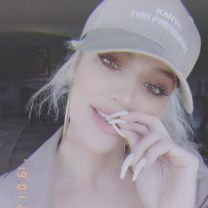 Khloe Kardashian in Kanye for President Baseball hat