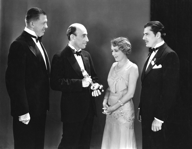 oscars fun facts Writer Hanns Kraly (1884-1950), President of the Academy of Motion Picture Arts and Sciences William C. DeMille (1878-1955), actress Mary Pickford (1892-1979) and actor Warner Baxter (1889-1951) attending the Oscars in Hollywood, California, USA, 4 April 1930. Kraly won the trophy for his play 'The Patriot', Pickford won for her performance in 'Coquette' and Baxter won for his performance in 'Old Arizona'.