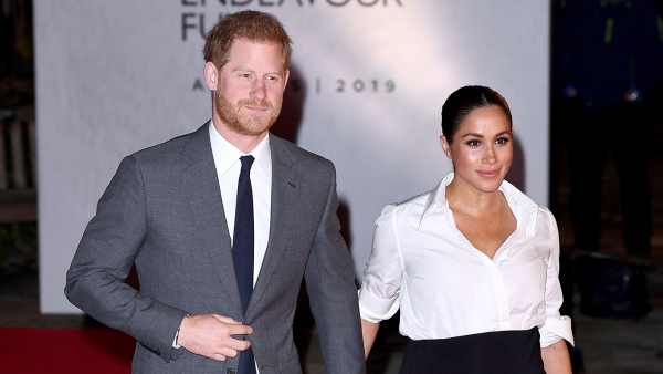 Duchess Meghan Glows While Hand in Hand With Prince Harry