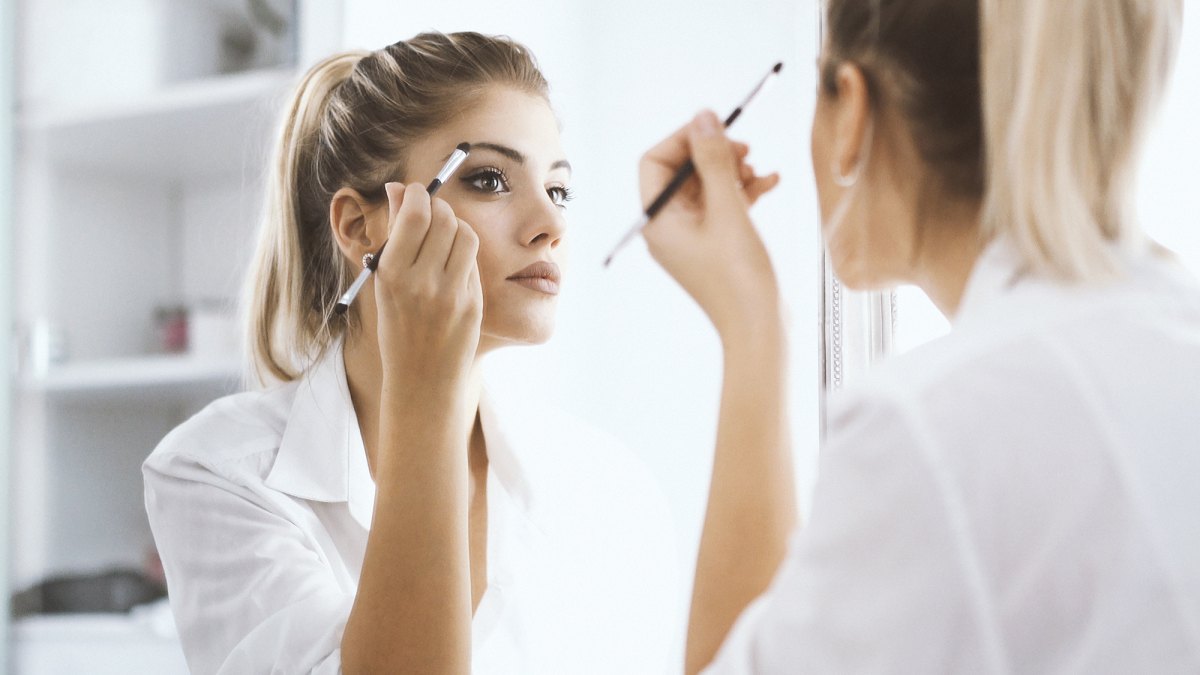 Woman Applying Makeup