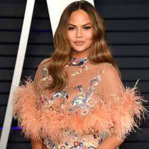 Chrissy Teigen Says She’s 20 Lbs. Heavier Than Before Having Son Miles