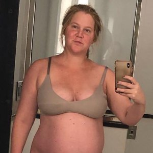 Pregnant Amy Schumer Shows Off Bare Baby Bump, Says She’s Feeling ‘Strong and Beautiful'