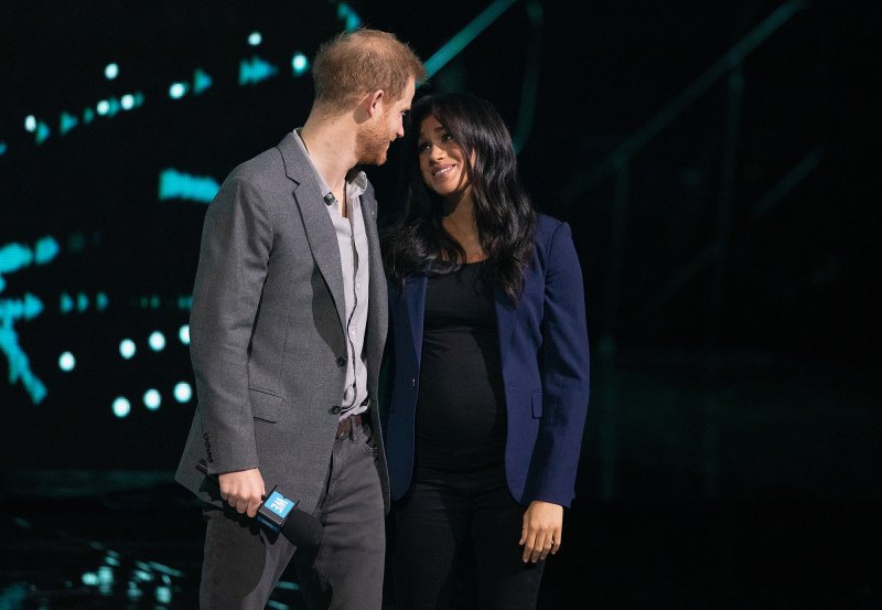 Prince Harry Surprises Crowd and Drags Pregnant Wife Duchess Meghan on Stage at Charity Event