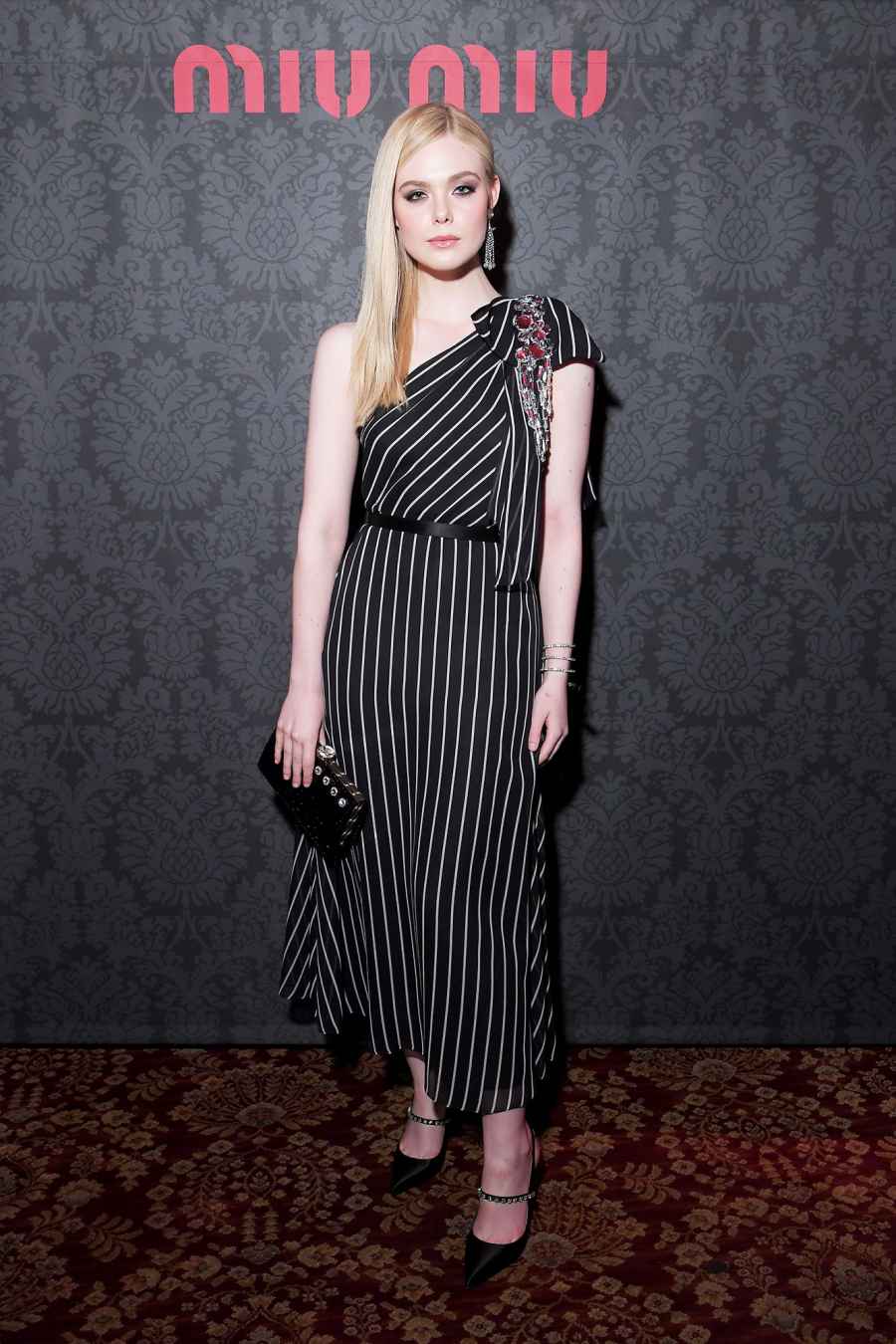 Elle Fanning Stars Closed Out Paris Fashion Week on a Sartorial High Note