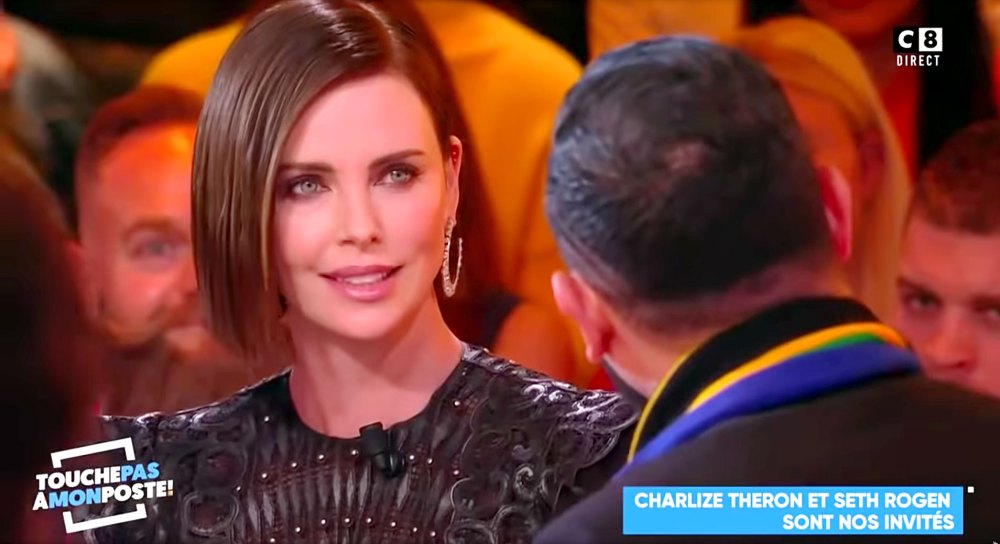 Charlize Theron Shuts Down Man Who Kissed Her Interpreter