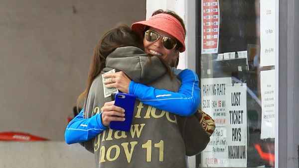 Lori Loughlin receives a warm hug from daughter Isabella Rose Giannulli