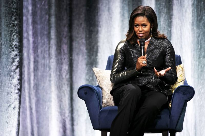 Michelle Obama pantsuit glitter Amsterdam