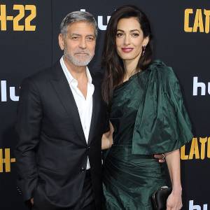 George Clooney and Amal Clooney and Archie