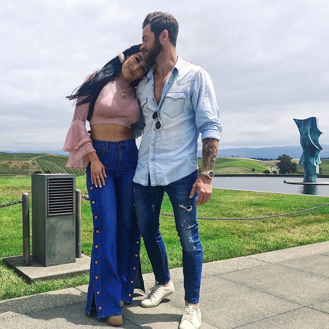 Nikki Bella Jumps Into Artem Chigvintsev’s Arms As They Reunite
