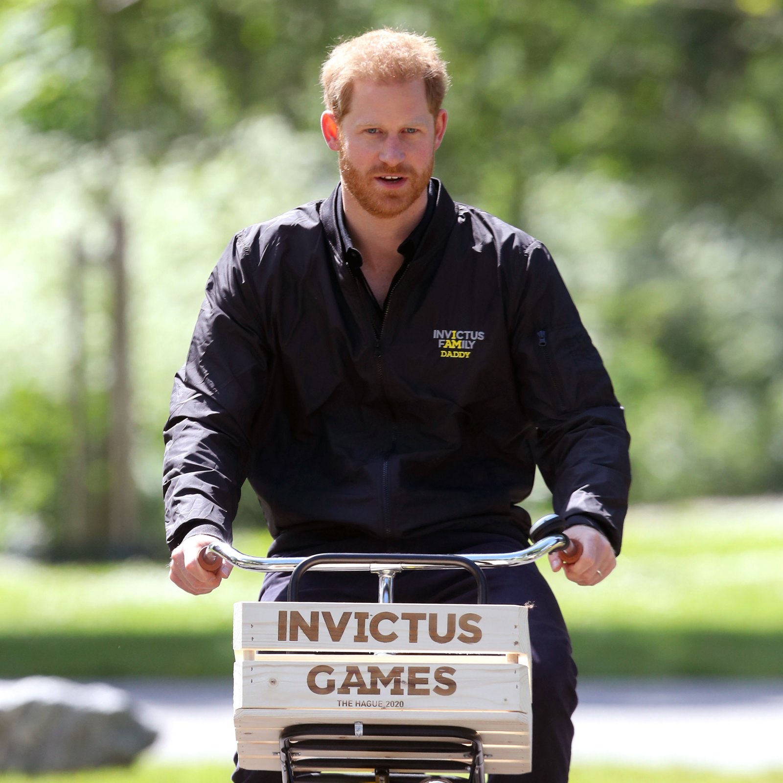 Prince Harry Gets a Gift for Baby Archie During Solo Day Trip to the Netherlands Dad Jacket Invictus Games