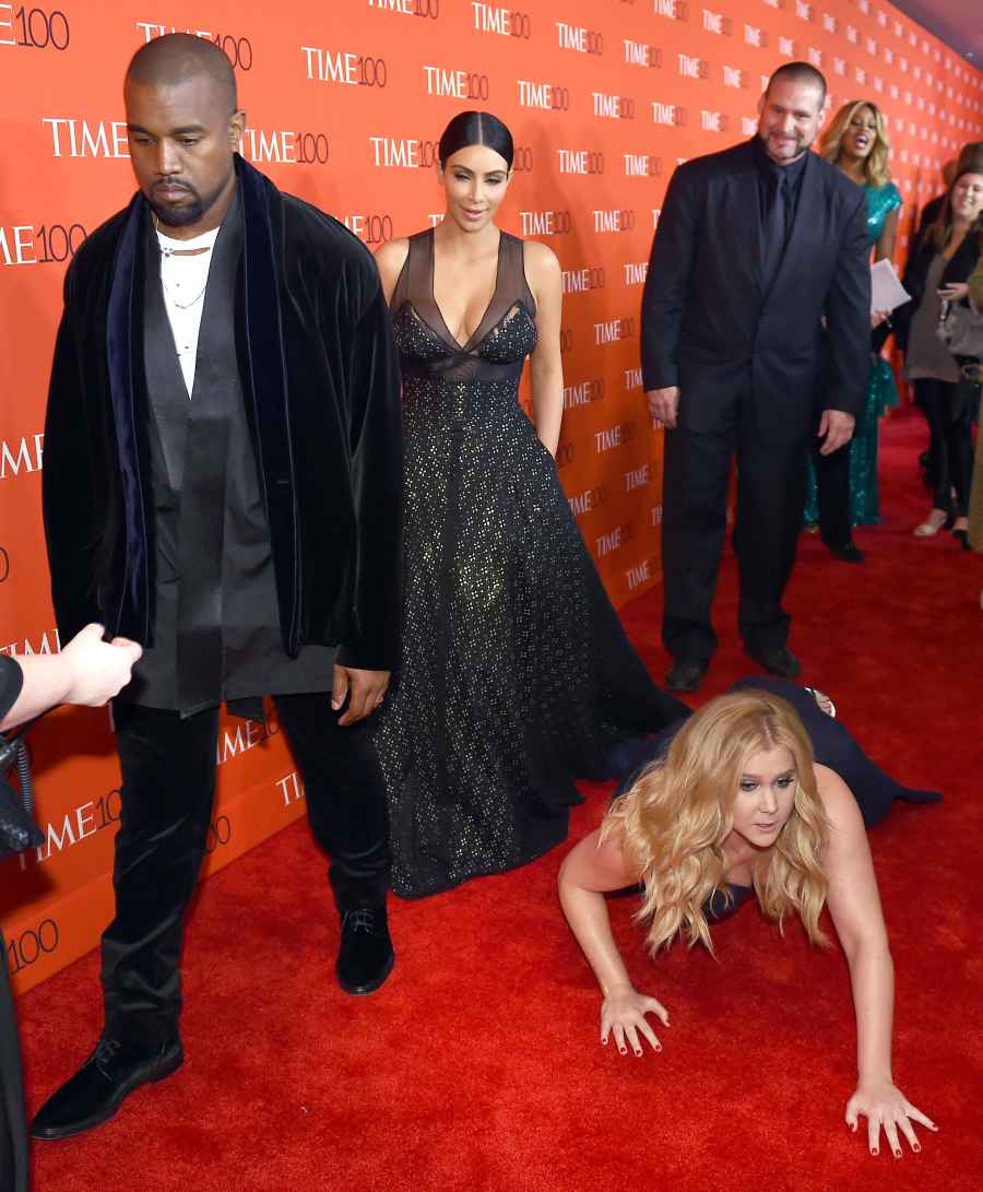 Revisit the 5 Most Kimye Things the Power Couple Have Done Ignoring Amy Schumer laying on the red carpet at 2015 Time 100 Gala