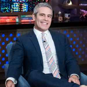 Andy Cohen Sitting in a Chair For His Show Watch What Happens Live With Andy Cohen