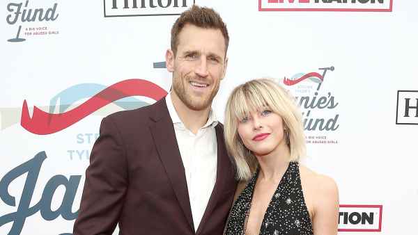 Brooks Laich Wears A Brown Suit and White Shirt and Julianne Hough