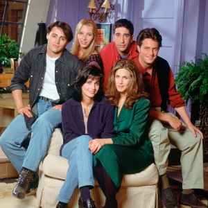 Cast of the Television Show Friends on NBC Sitting On A Chair