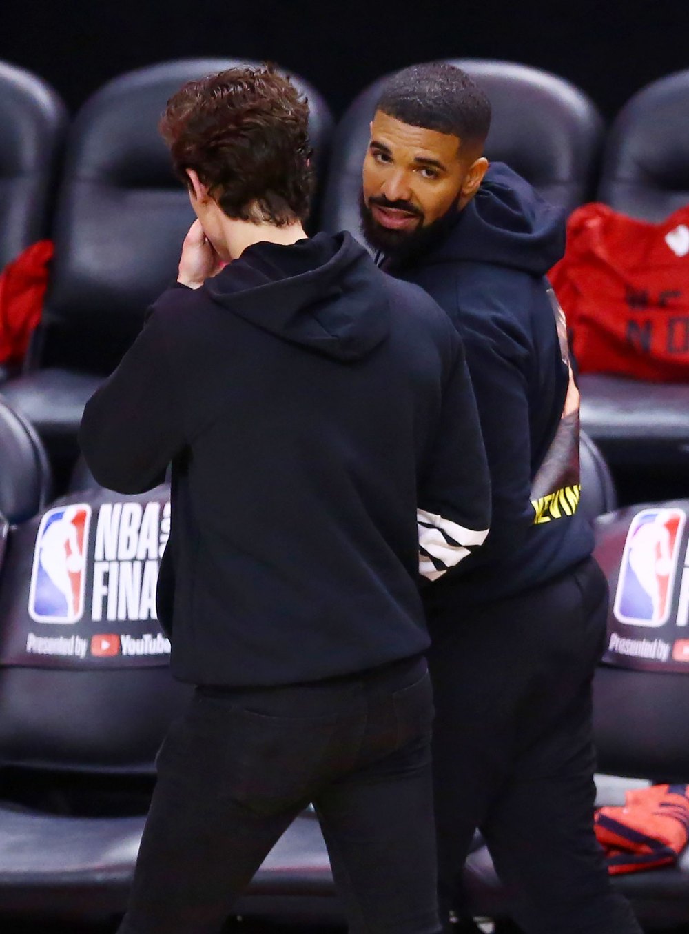 Drake Wears Home Alone Shirt At NBA Finals