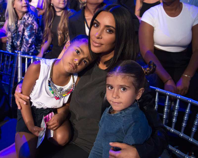Kim Kardashian cuddles daughter North West and niece Penelope Disick