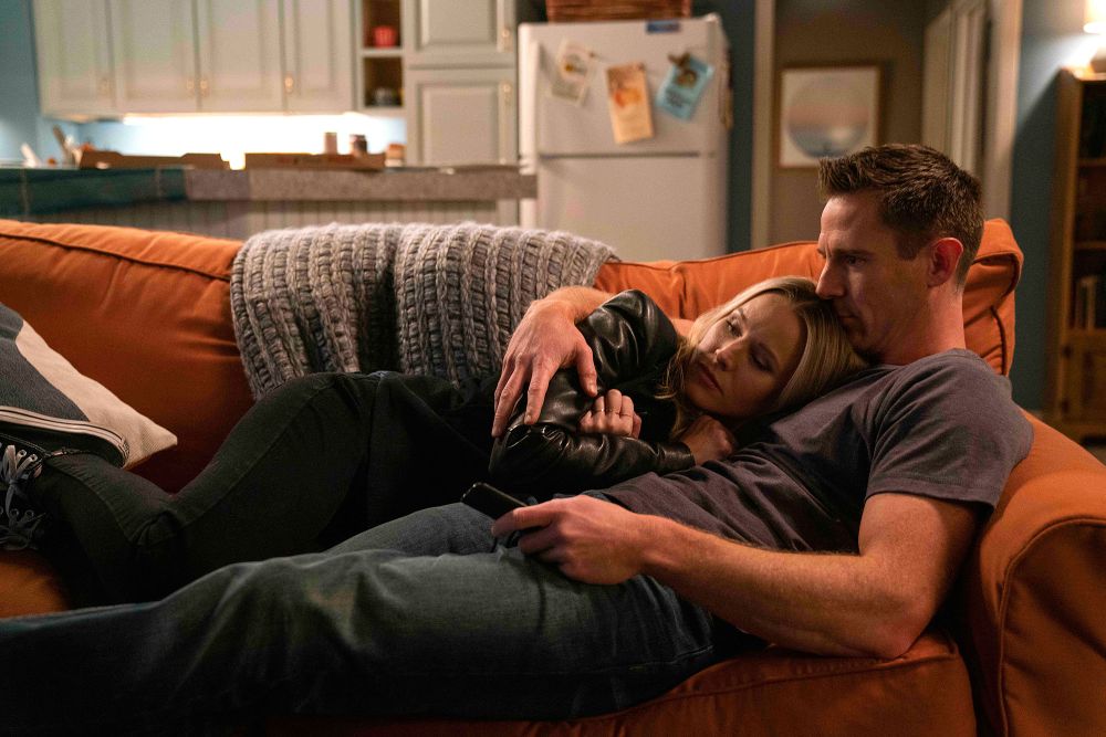 Kristen Bell and Jason Dohring Laying On A Couch Veronica Mars