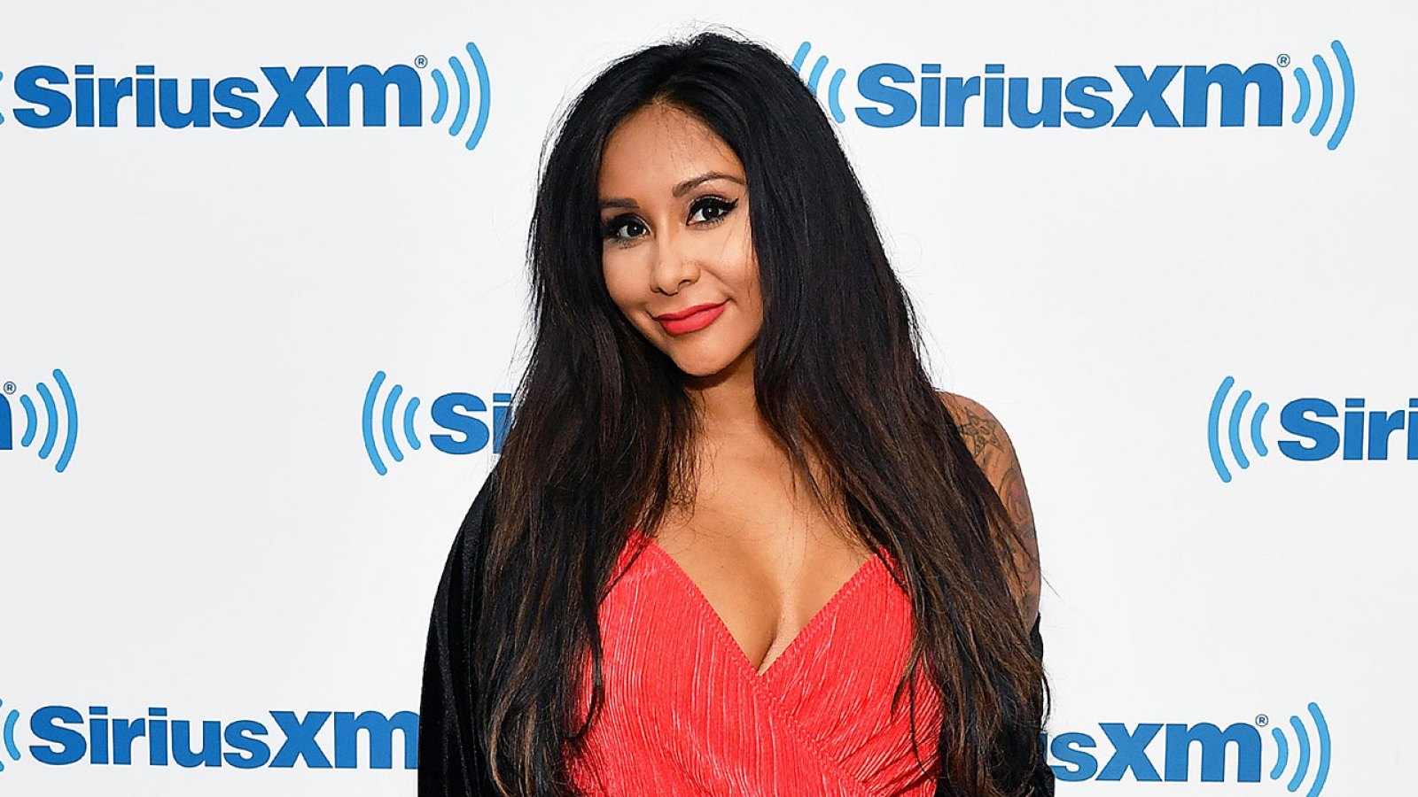 Nicole Snooki Polizzi Wearing a Red Dress and Black Scarf
