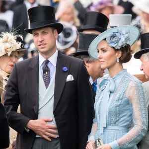 Prince William Wearing A Tux With Tails a Top Hat and Duchess Kate Wearing a Blue Dress With Bow and Blue Hat Fine Dress Royal Ascot