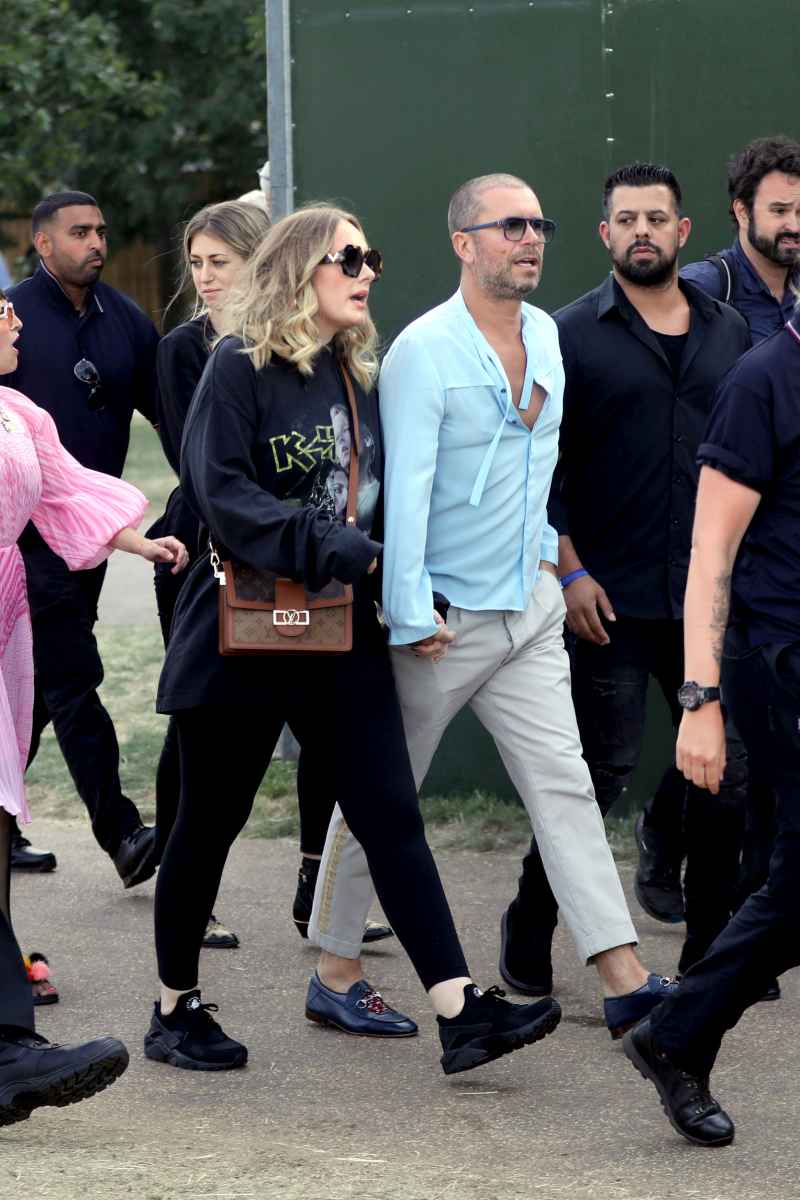 Adele Shows Off Her Slimmer Figure as She Holds Hands With Male Pal
