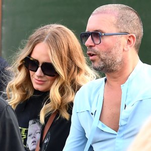 Adele Shows Off Her Slimmer Figure as She Holds Hands With Male Pal
