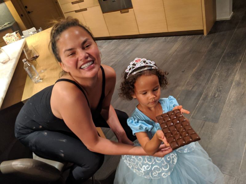 Chrissy Teigen, John Legend Make Chocolates With Daughter Luna