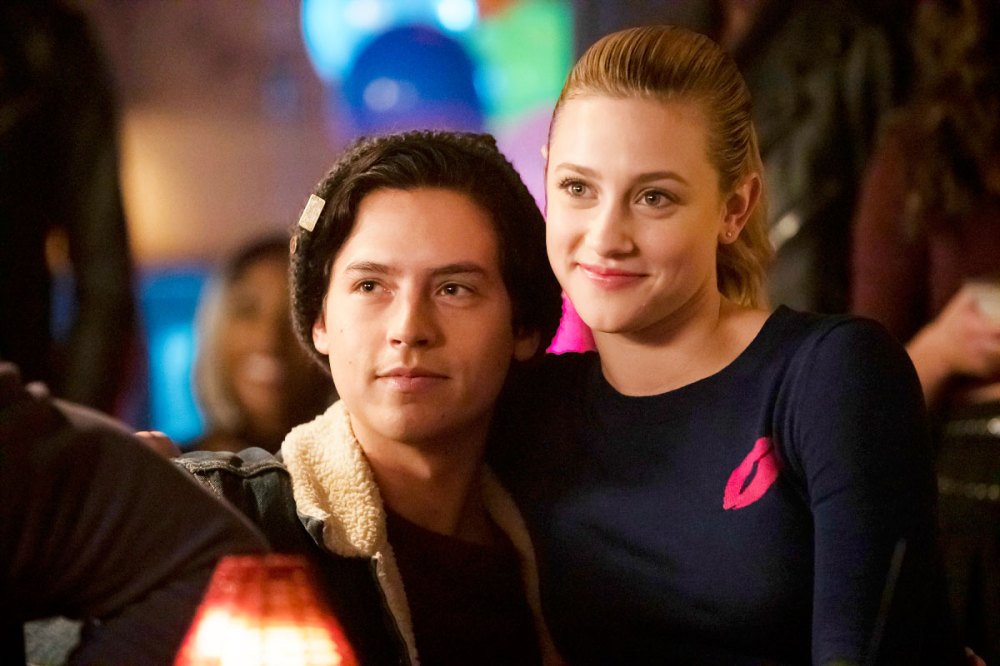 Cole Sprouse as Jughead and Lili Reinhart as Betty in Riverdale Bughead is Clinging to One Another During Senior Year