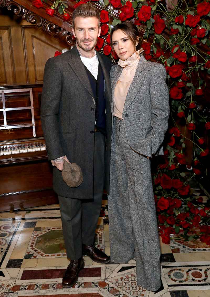 David-and-Victoria-Beckham-suits-rose-wall