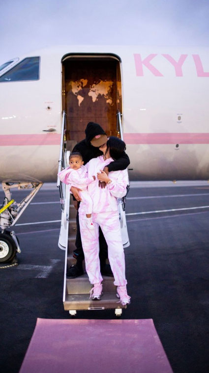 Kylie Jenner Kisses Travis Scott on Steps of Private Plane as She Embarks on Girls’ Trip With Stormi