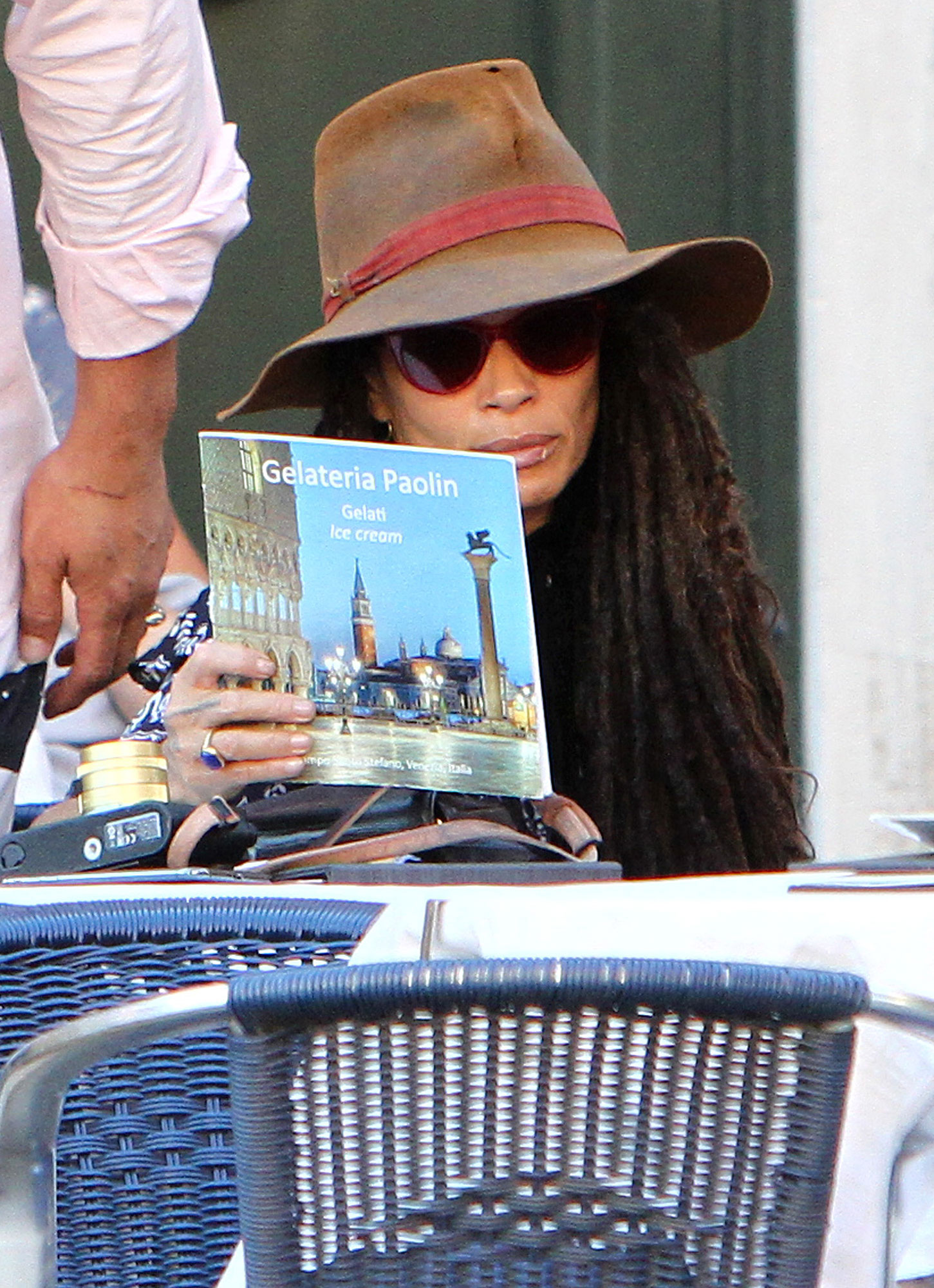Lisa Bonet Explore Italy Brown Rim Hat Reading