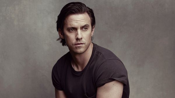 Milo-Ventimiglia-tshirt-chair-arms