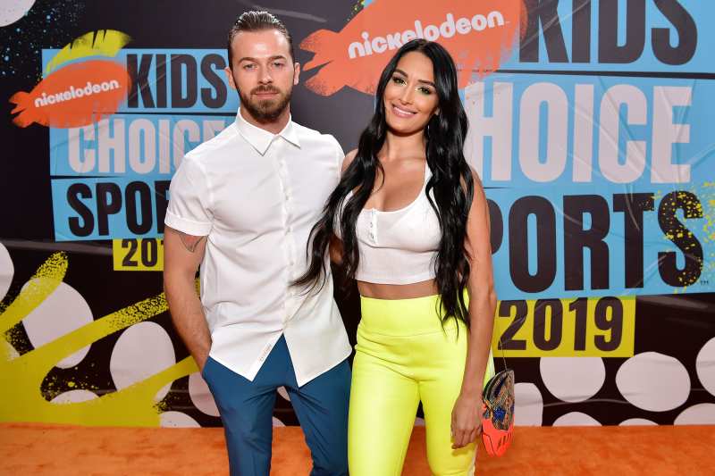 Nikki Bella and Artem Chigvintsev Red Orange Carpet Nickelodeon Kids' Choice Sports 2019
