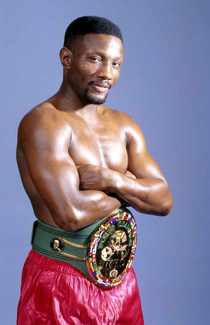 Pernell Whitaker Red Trunks Championship Belt Arms Folded Dead